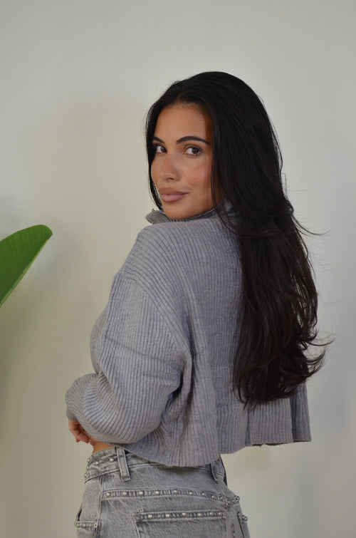 Pull con zip trasversale